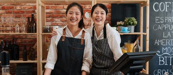 Two business owners in their cafe